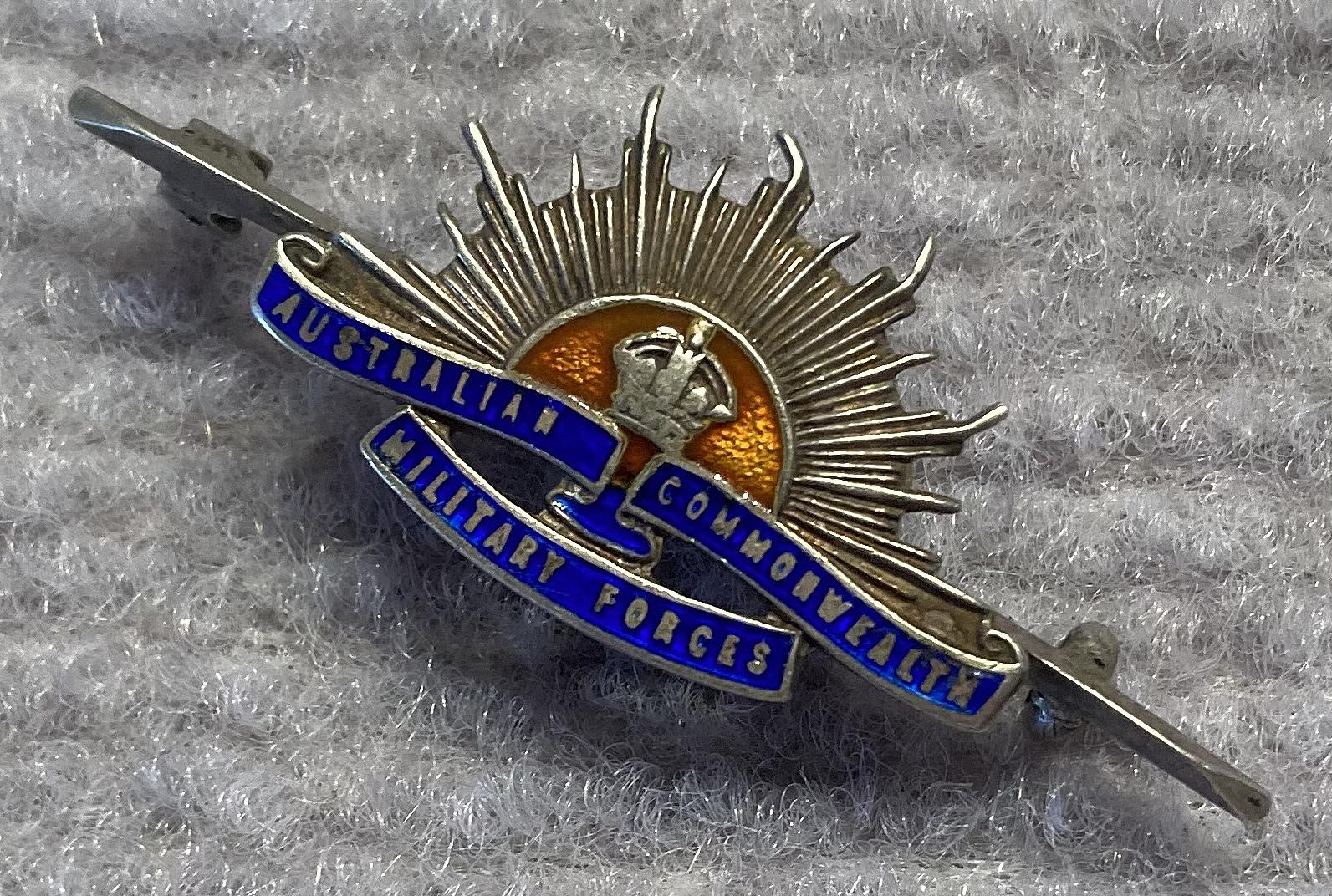 Other angled view of sterling silver and enamel Rising Sun badge sweetheart brooch
