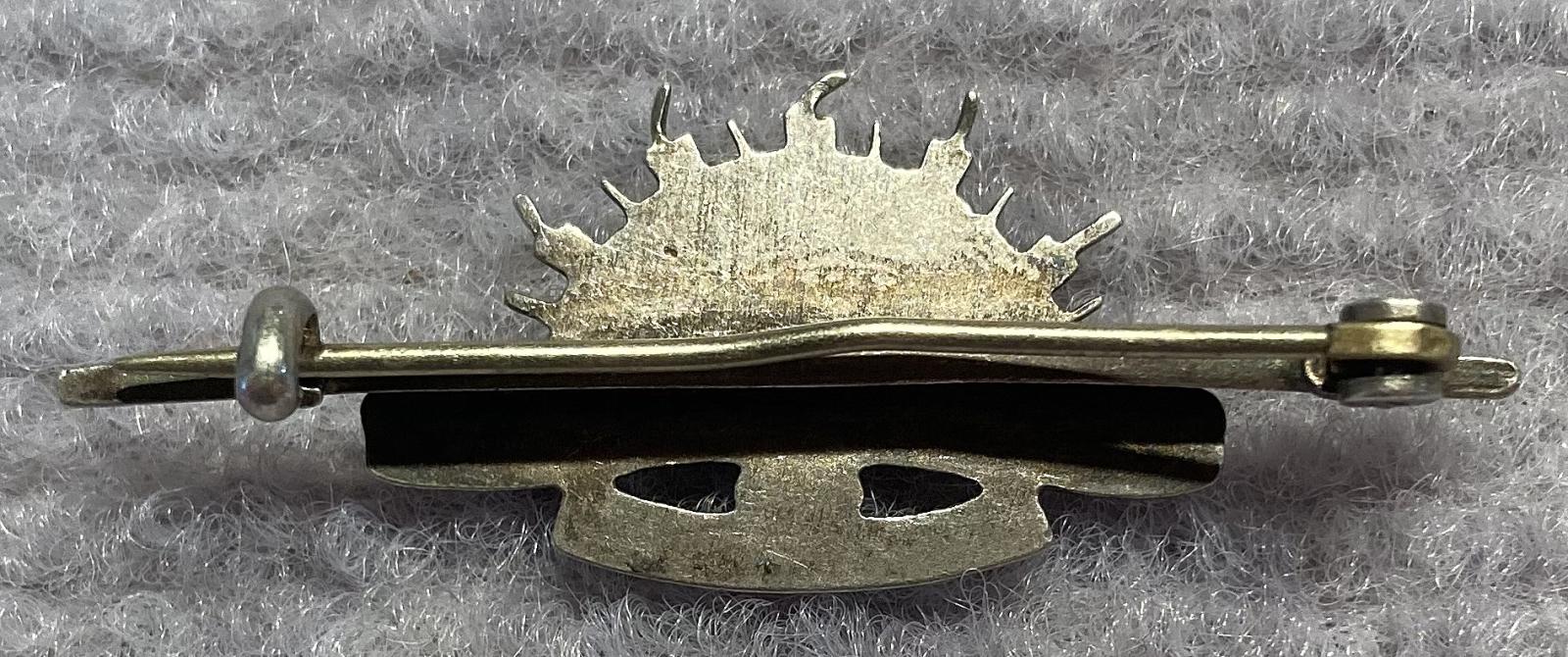 Reverse of sterling silver and enamel Rising Sun badge sweetheart brooch - pin closed