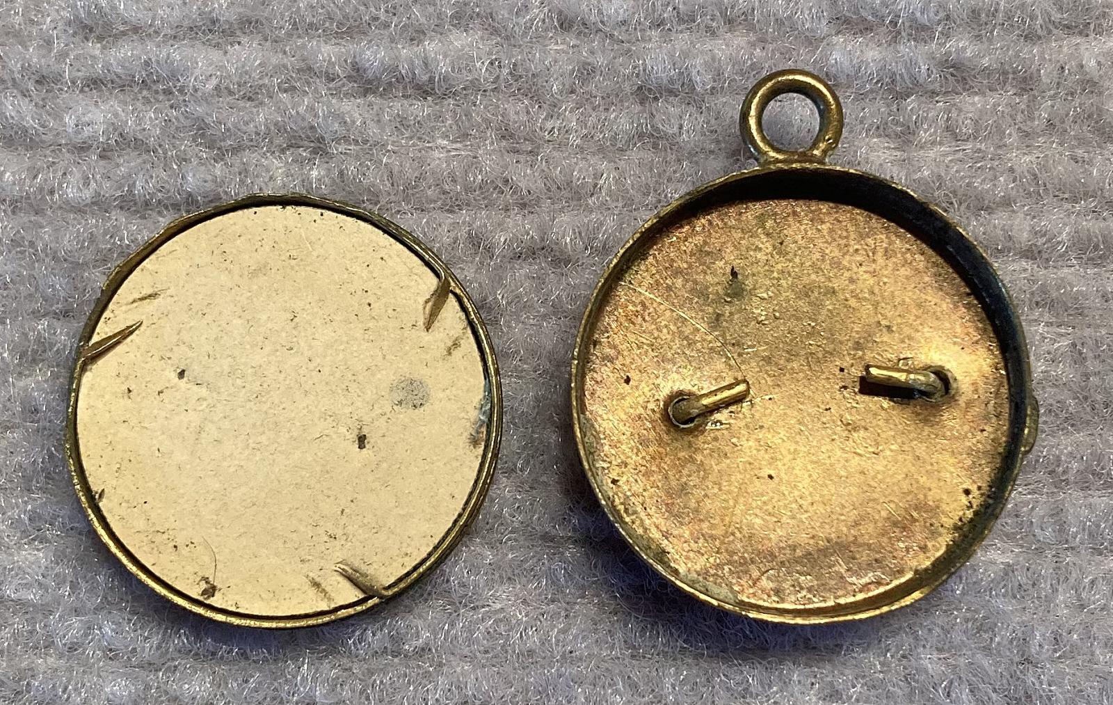 Inside of gold tone metal and enamel Rising Sun badge sweetheart pendant locket 