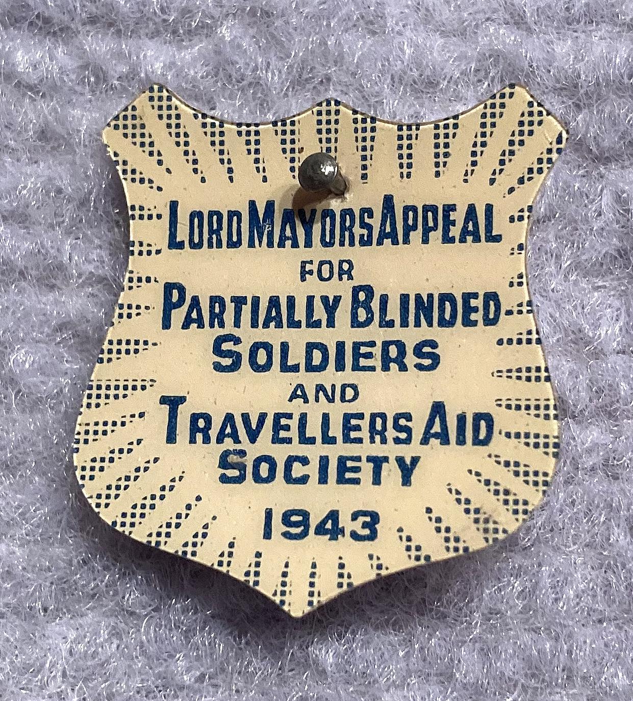 'Lord Mayors Appeal for Partially Blinded Soldiers and Travellers Aid Society 1943' celluloid fundraising pin 
