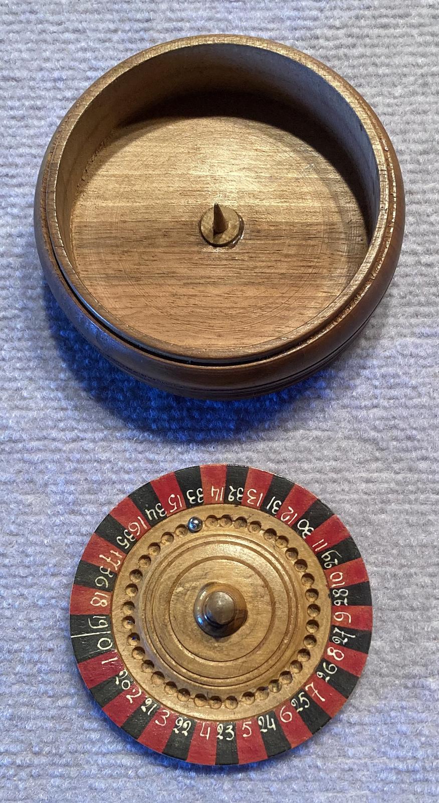 Trench art timber roulette wheel with Rising Sun badge - wheel removed from exterior