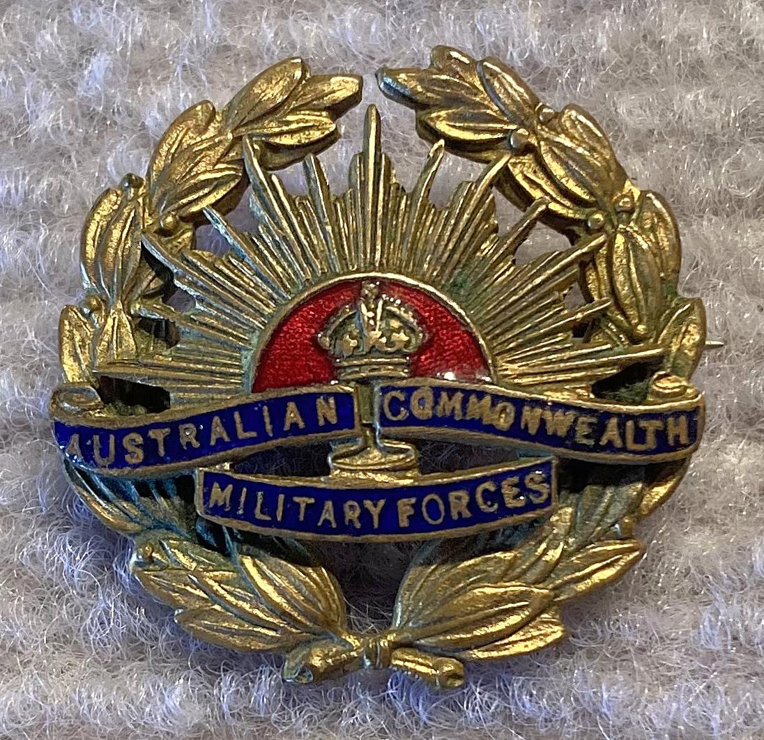 Brass and enamel Rising Sun badge sweetheart brooch