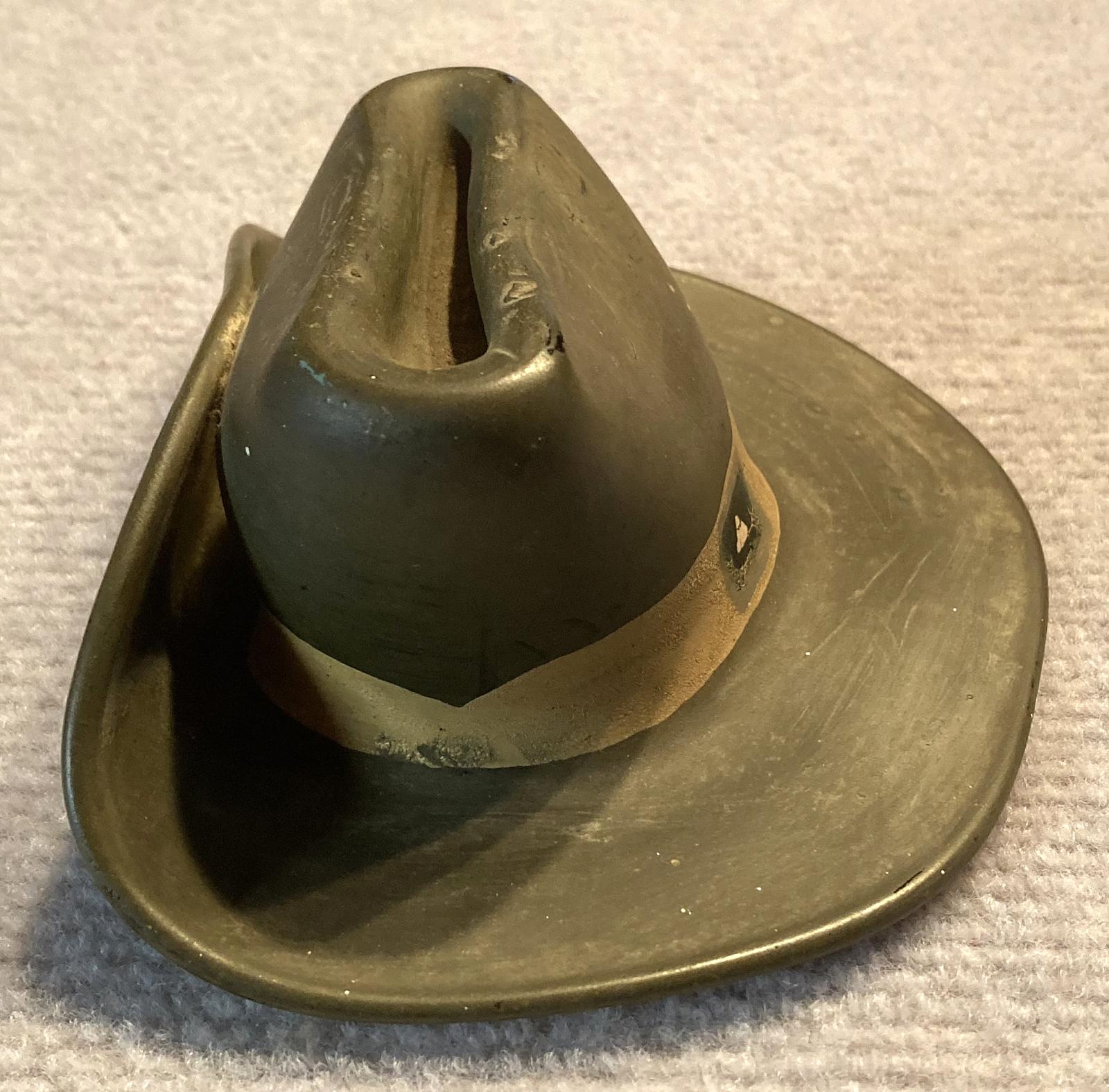 Other side view of slouch hat made from melted milk bottle by Italian POW - Cowra