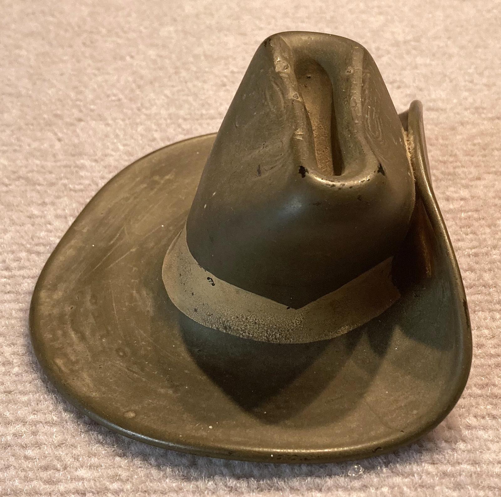 Side view of slouch hat made from melted milk bottle by Italian POW - Cowra