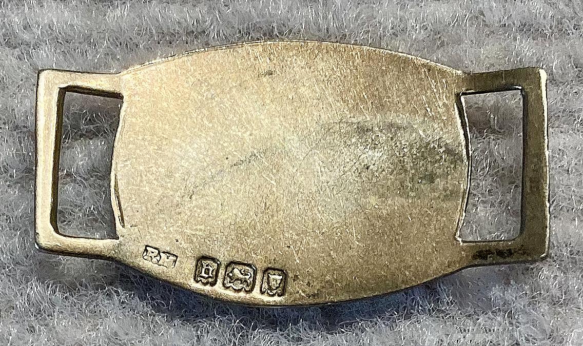 Reverse of WWI era silver identity tag - Lance Corporal R.J. Williams