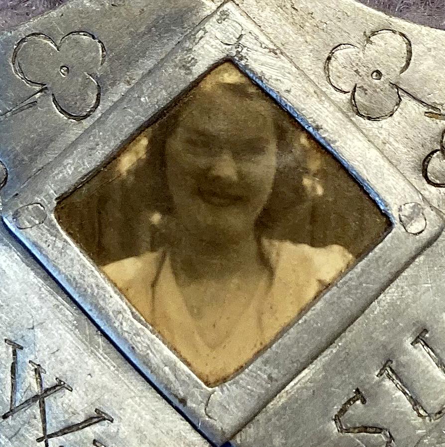 Close up of woman in photograph