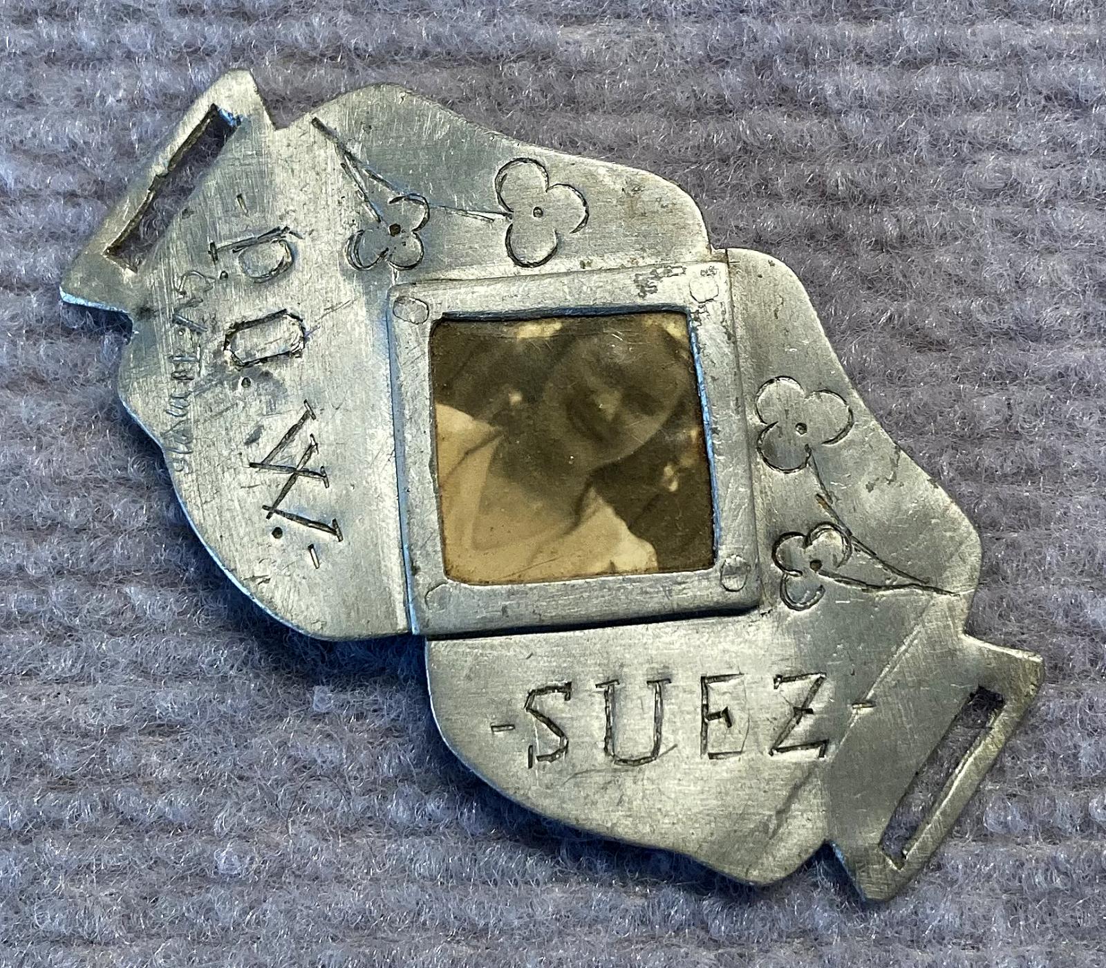 Other angled view of trench art photo bracelet made by a Prisoner of War