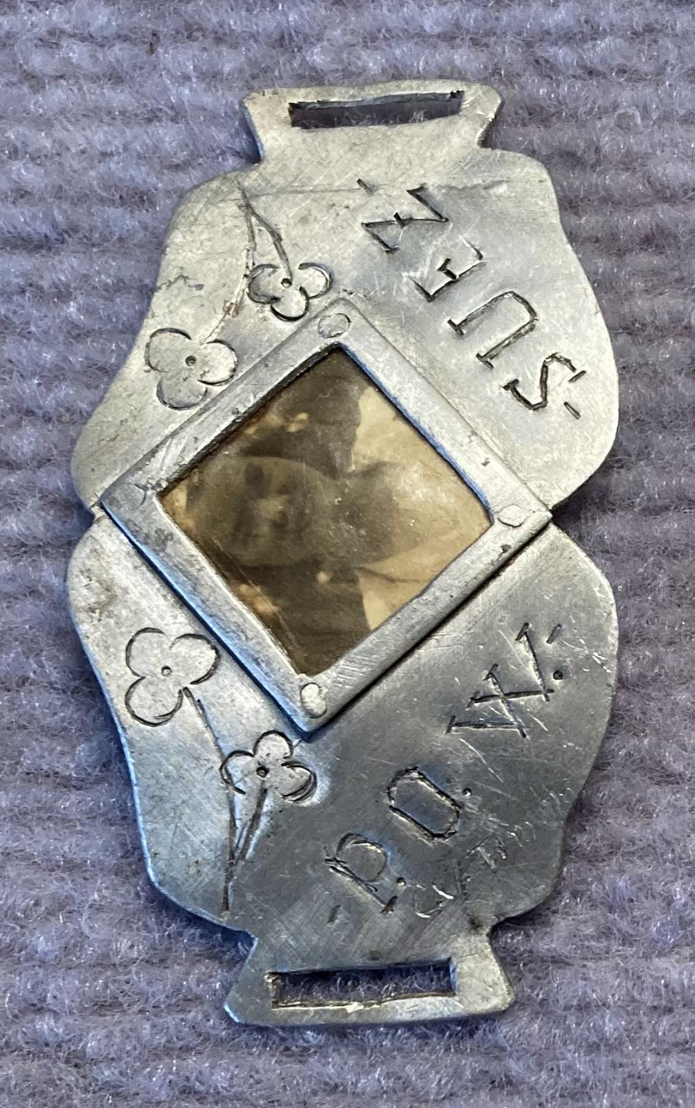 End view of trench art photo bracelet made by a Prisoner of War