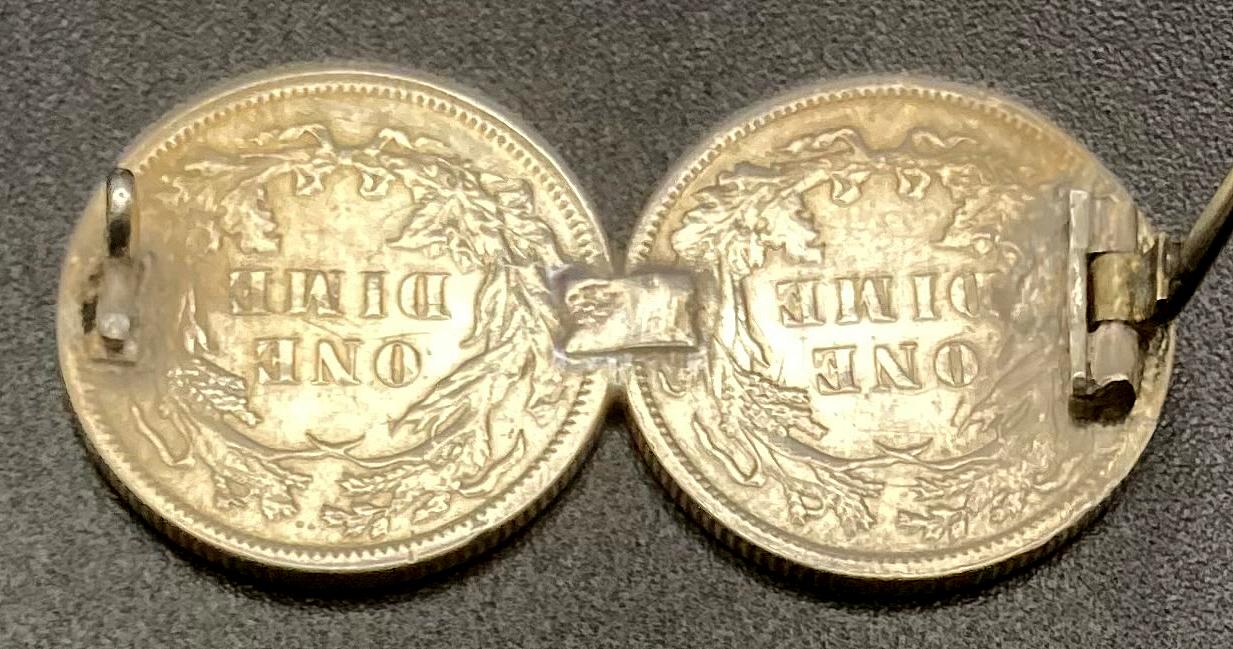 Reverse of sweetheart brooch made from two American dimes - 1886 - clasp open