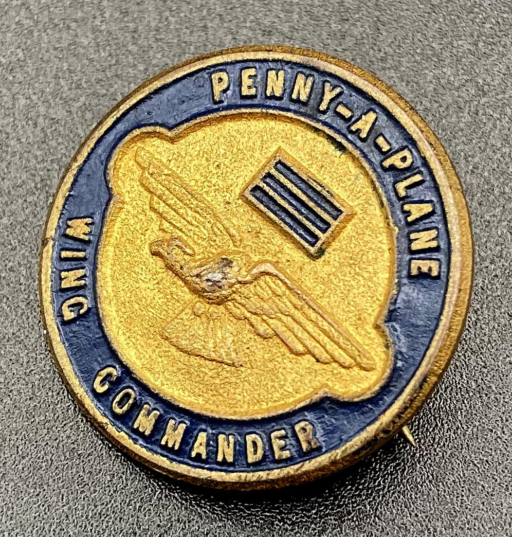 Other angled view of WWII era fundraising badge - 'Penny-a-plane' appeal
