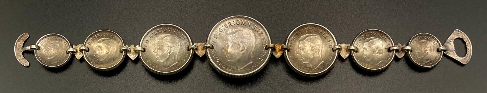 Reverse of WWII era trench art coin bracelet dated 1943