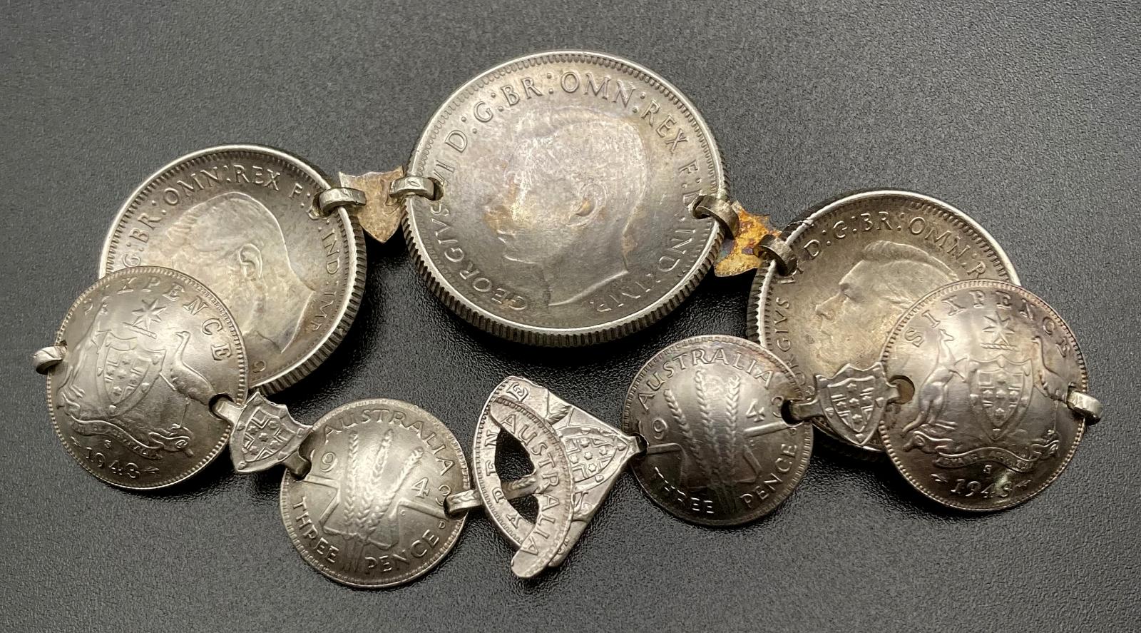 WWII era trench art coin bracelet dated 1943 with clasp closed