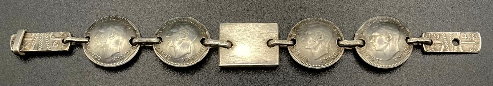 WWII era trench art coin bracelet for child dated 1943