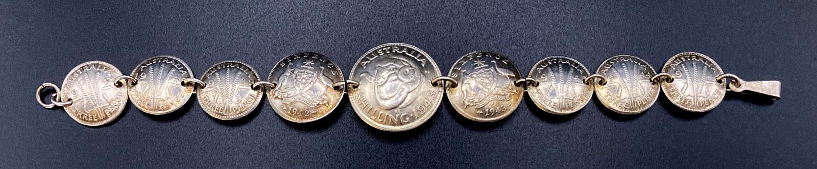 WWII era trench art coin bracelet dated 1942-1944
