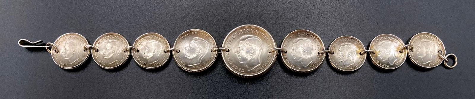 Reverse of WWII era trench art coin bracelet dated 1942-1944