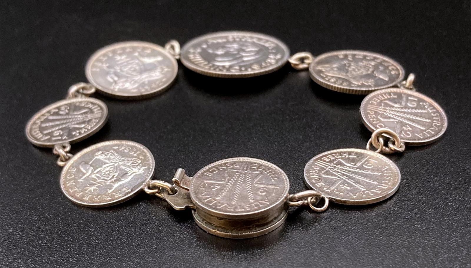 Oblique view of WWII era trench art coin bracelet showing depth of clasp