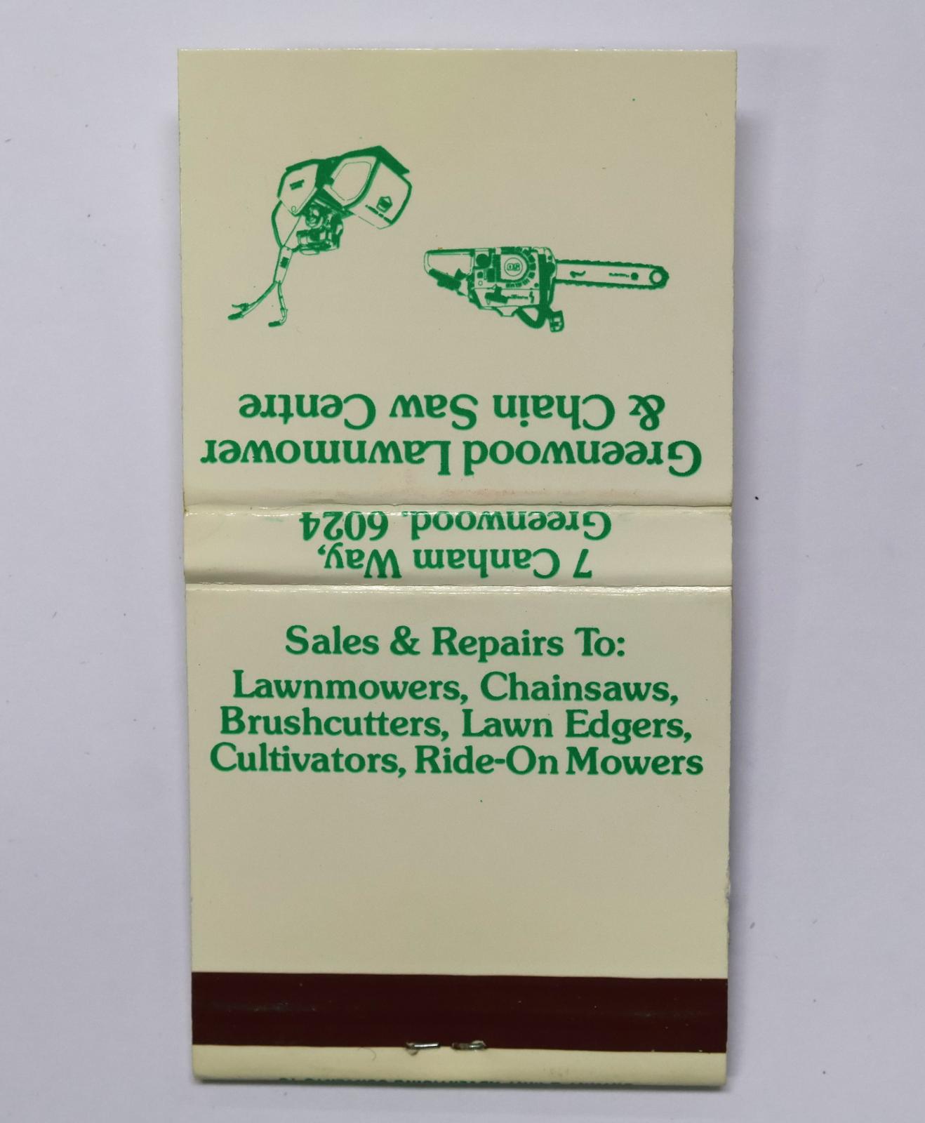 Square shaped matchbook, white background with green writing. There is a staple in the front holding the matches in place. The back of the matchbook has a brown igniting panel. 