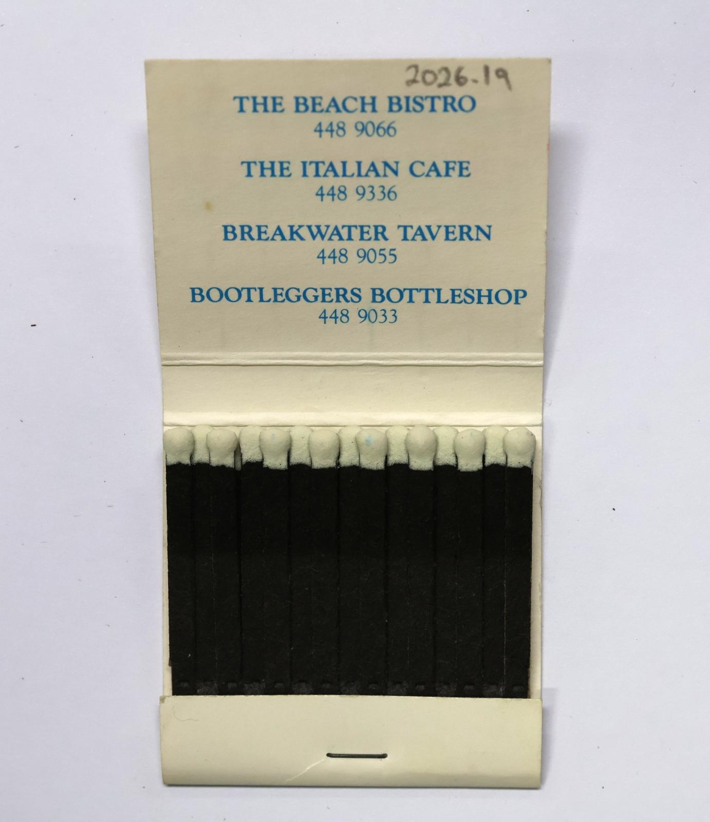 The inside has 30 black matchsticks with white match heads.  