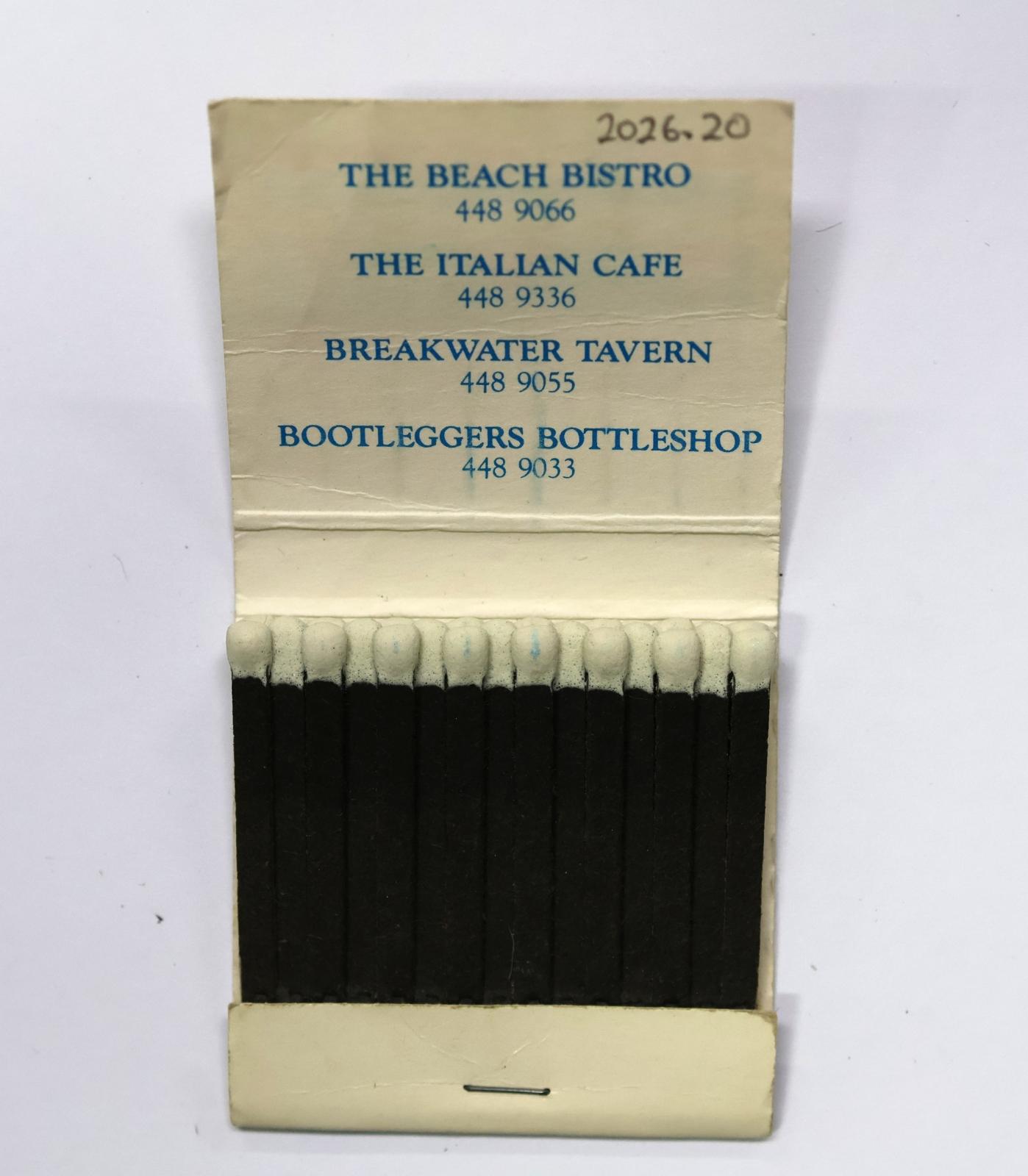 The inside has 30 black matchsticks with white match heads.  