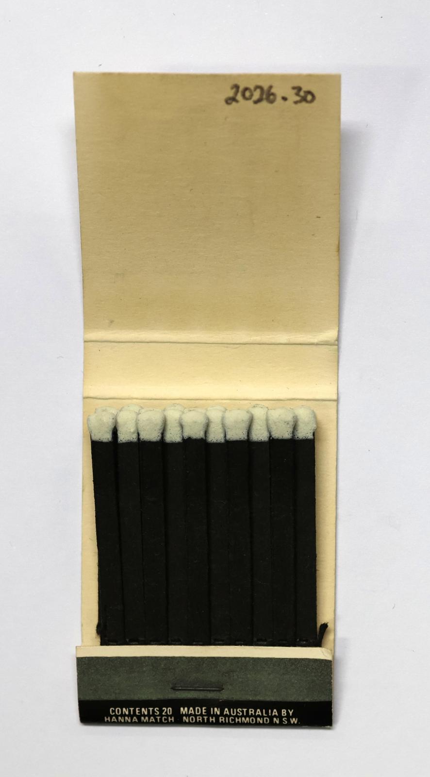  The inside has 20 black matchsticks with white match heads.