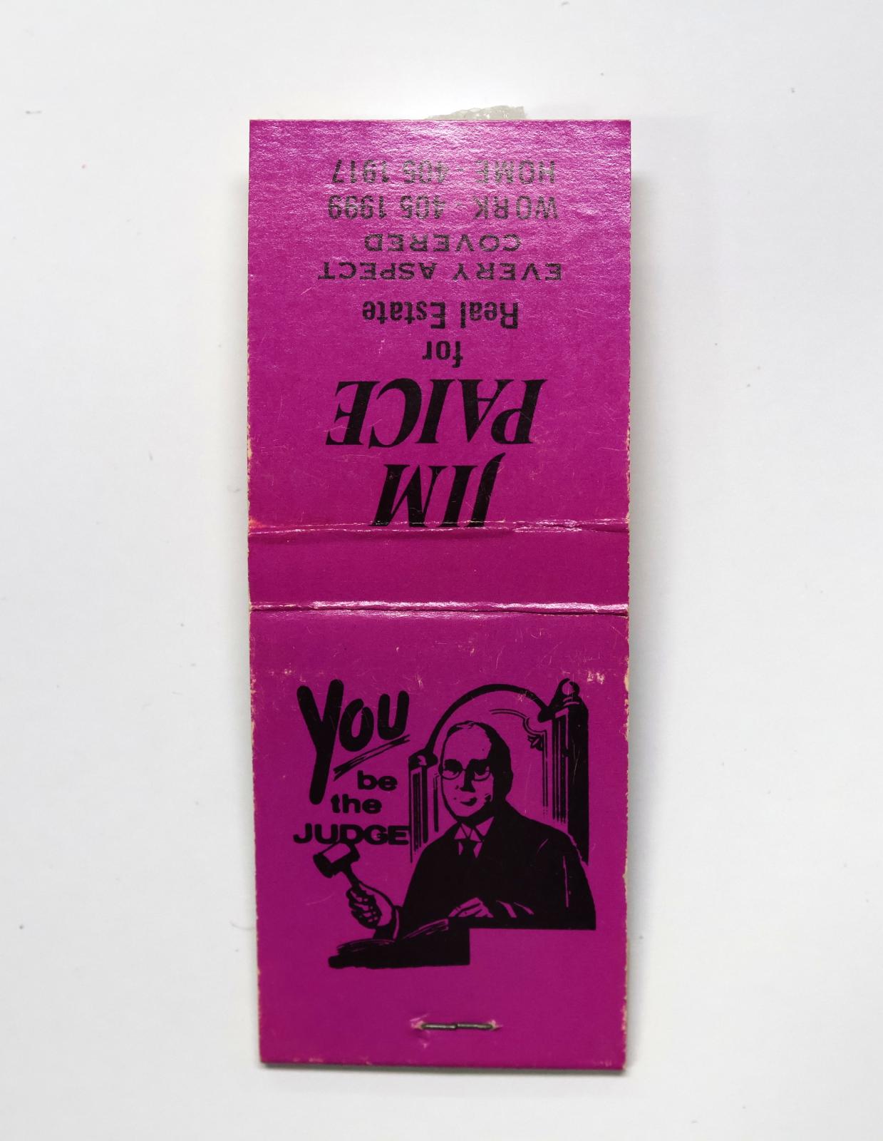 Rectangular shaped matchbook with purple background and black text.  The front of the matchbook has a grey igniting panel. The back of the matchbook has an image of a judge with a gavel. 