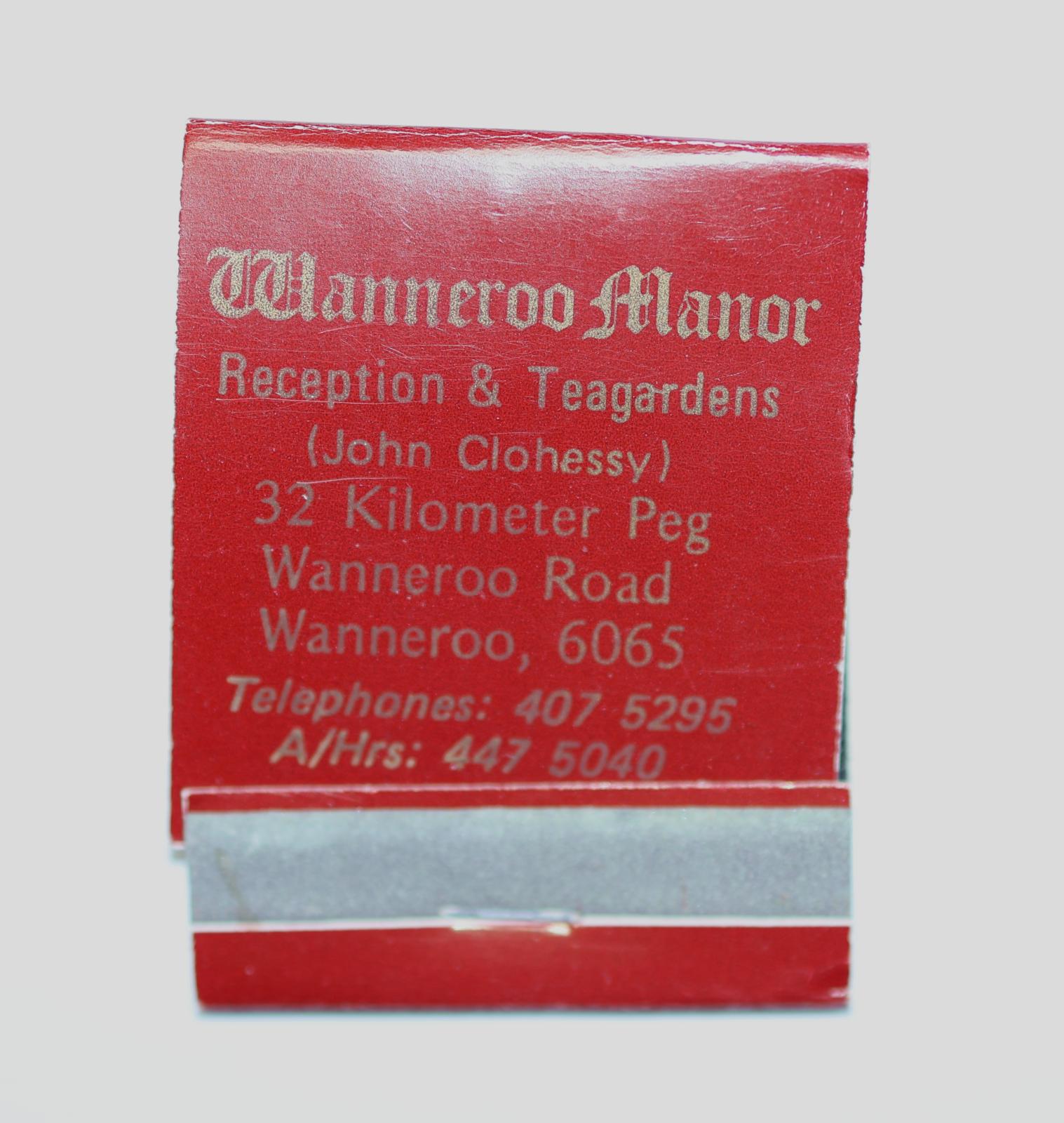 Rectangular shaped matchbook with dark red background and gold text. The front of the matchbook has a grey igniting panel. 