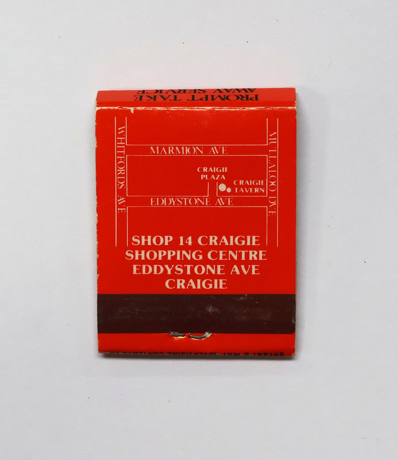 The back of the matchbook has a brown igniting panel. The front and the back of the matchbook have white text, there is map of the location on the back. 