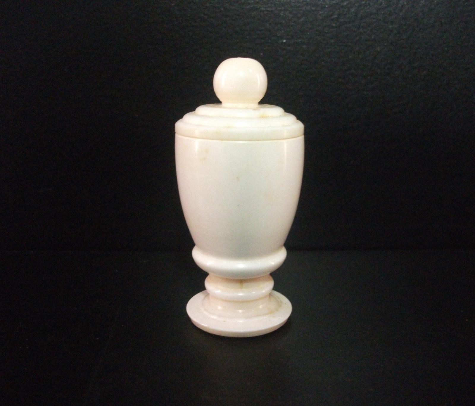 Turned ivory jar with fitted lid.