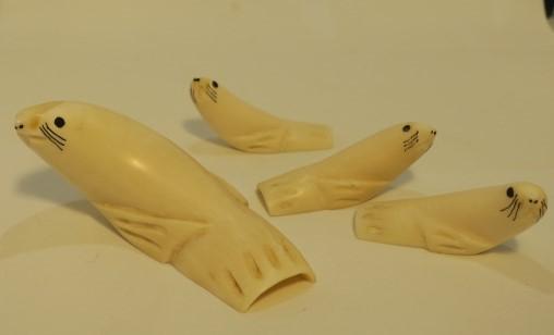 Four seals, one large and 3 small. 