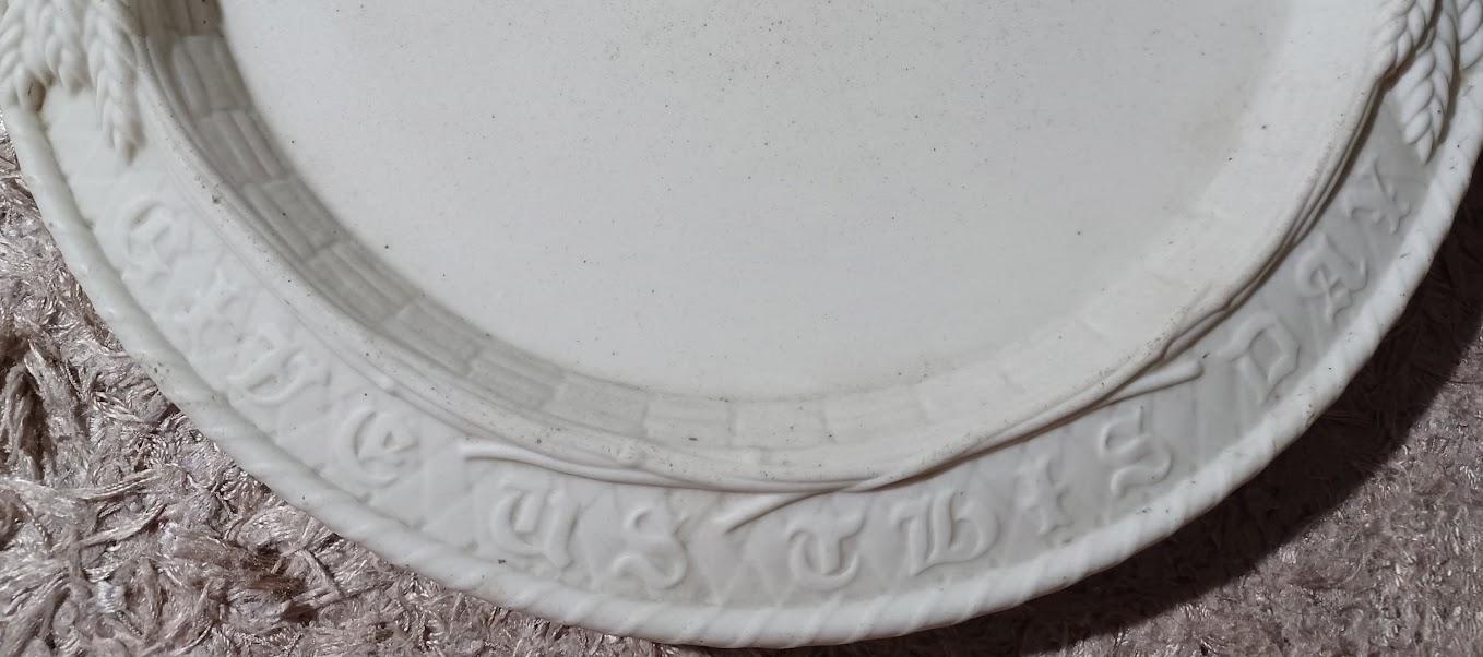 Wording on alabaster bread plate