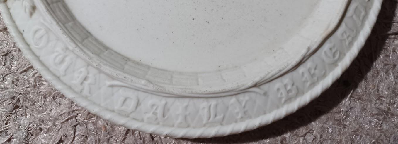 Wording on alabaster bread plate