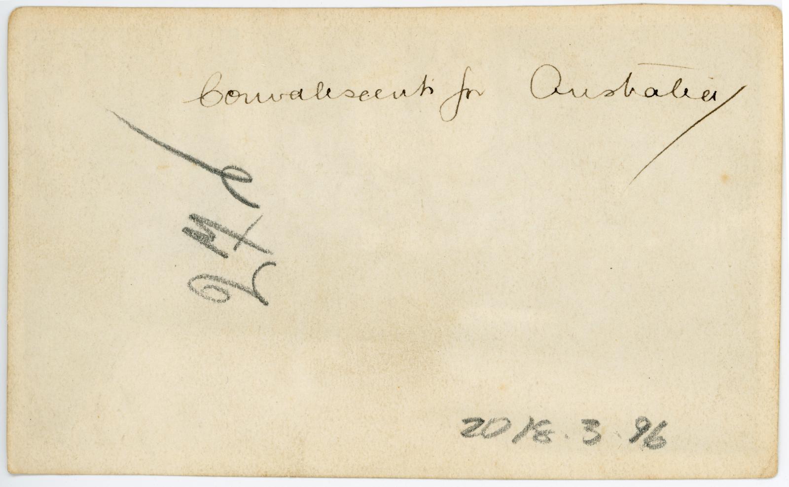 Rear view showing inscription.