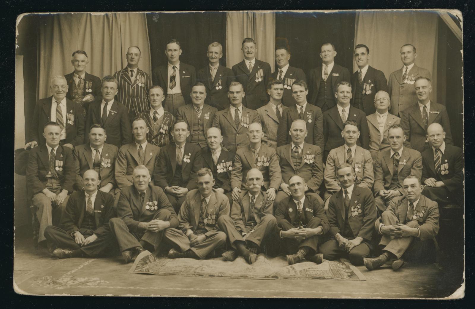 Black and White Photographic Postcard of First World War Veterans with Pte C.W. FEIDLER, 3326