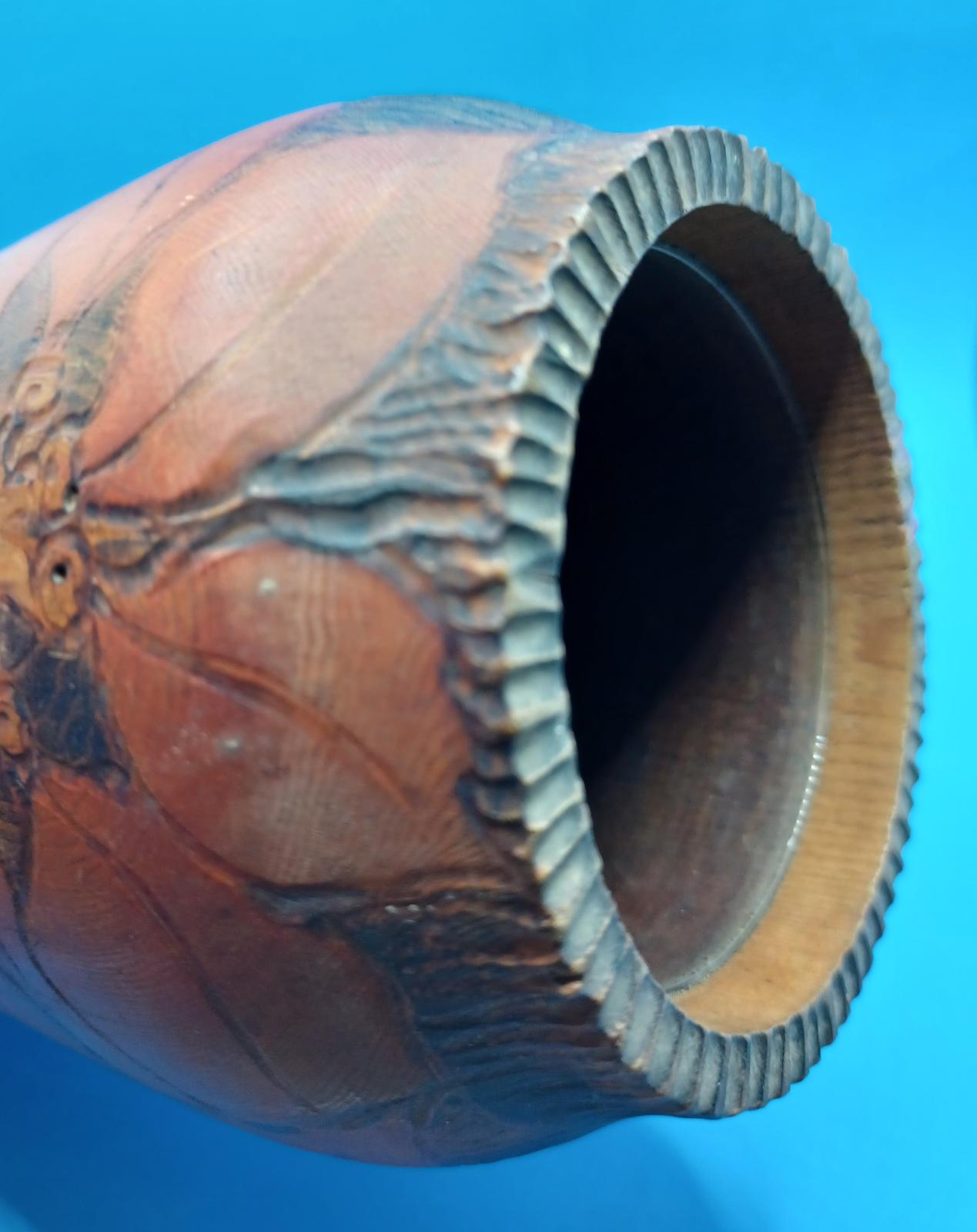Inside wooden vase