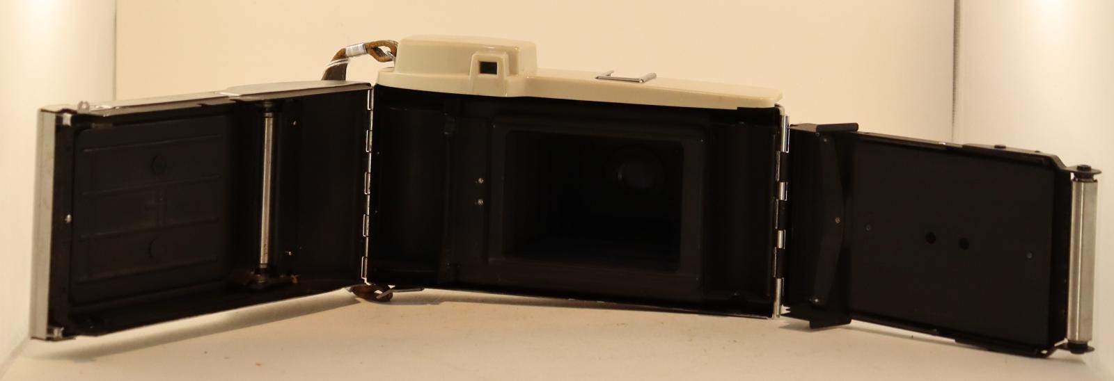 View of fully open back of Polaroid Land Camera