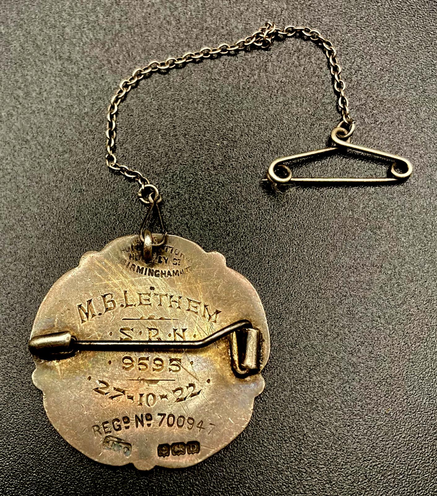 Reverse of The General Nursing Council for England and Wales badge presented to M.B. Lethem 1922