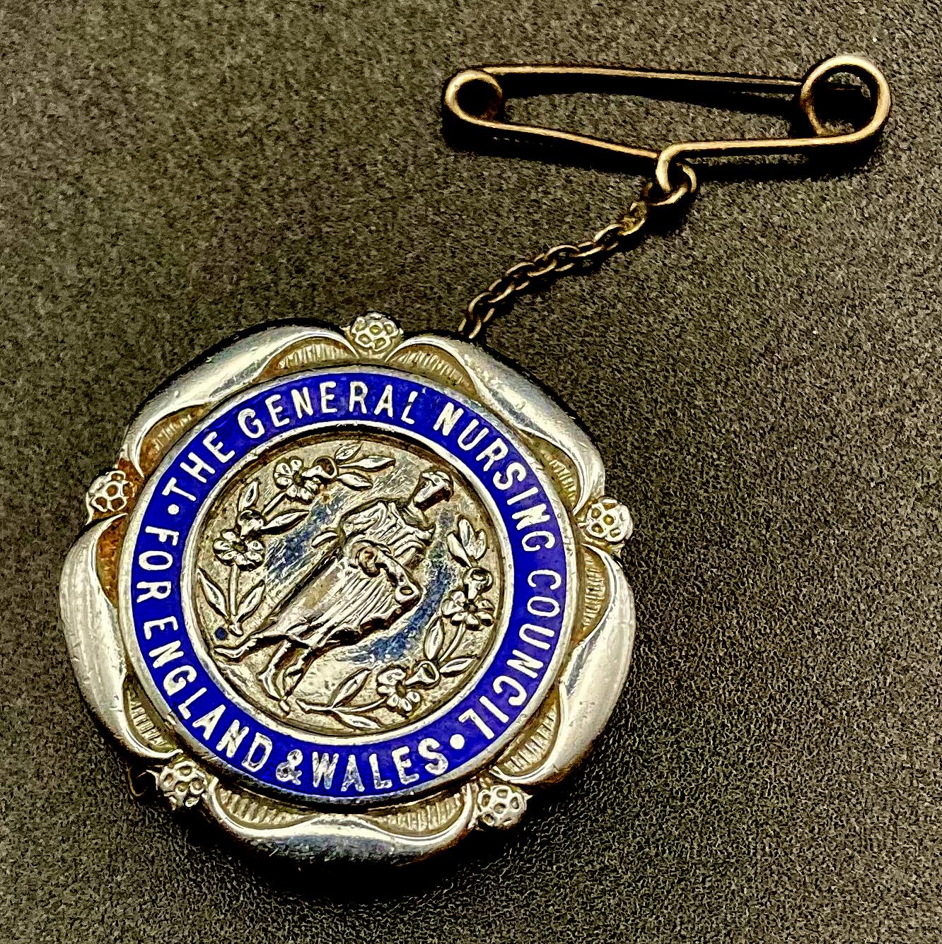 Other angled view of The General Nursing Council for England and Wales badge presented to E.E. Webb 1943