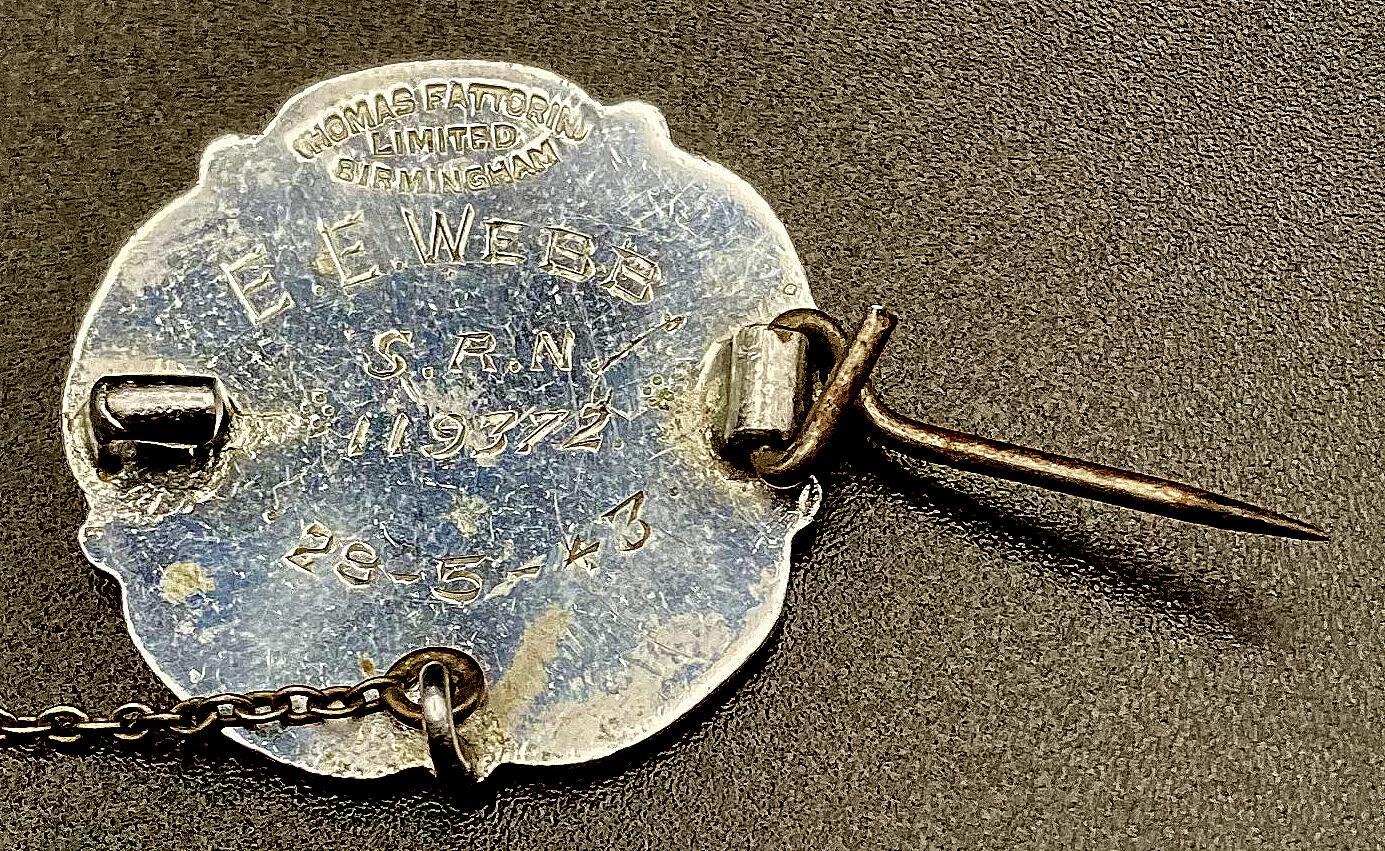 Reverse of The General Nursing Council for England and Wales badge presented to E.E. Webb 1943 - pin open