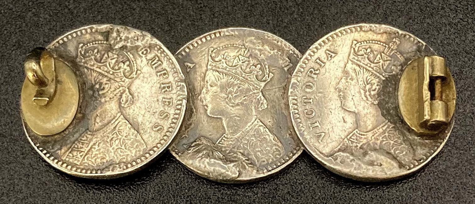 Reverse of sweetheart brooch made from three Indian Two Annas coins - 1896