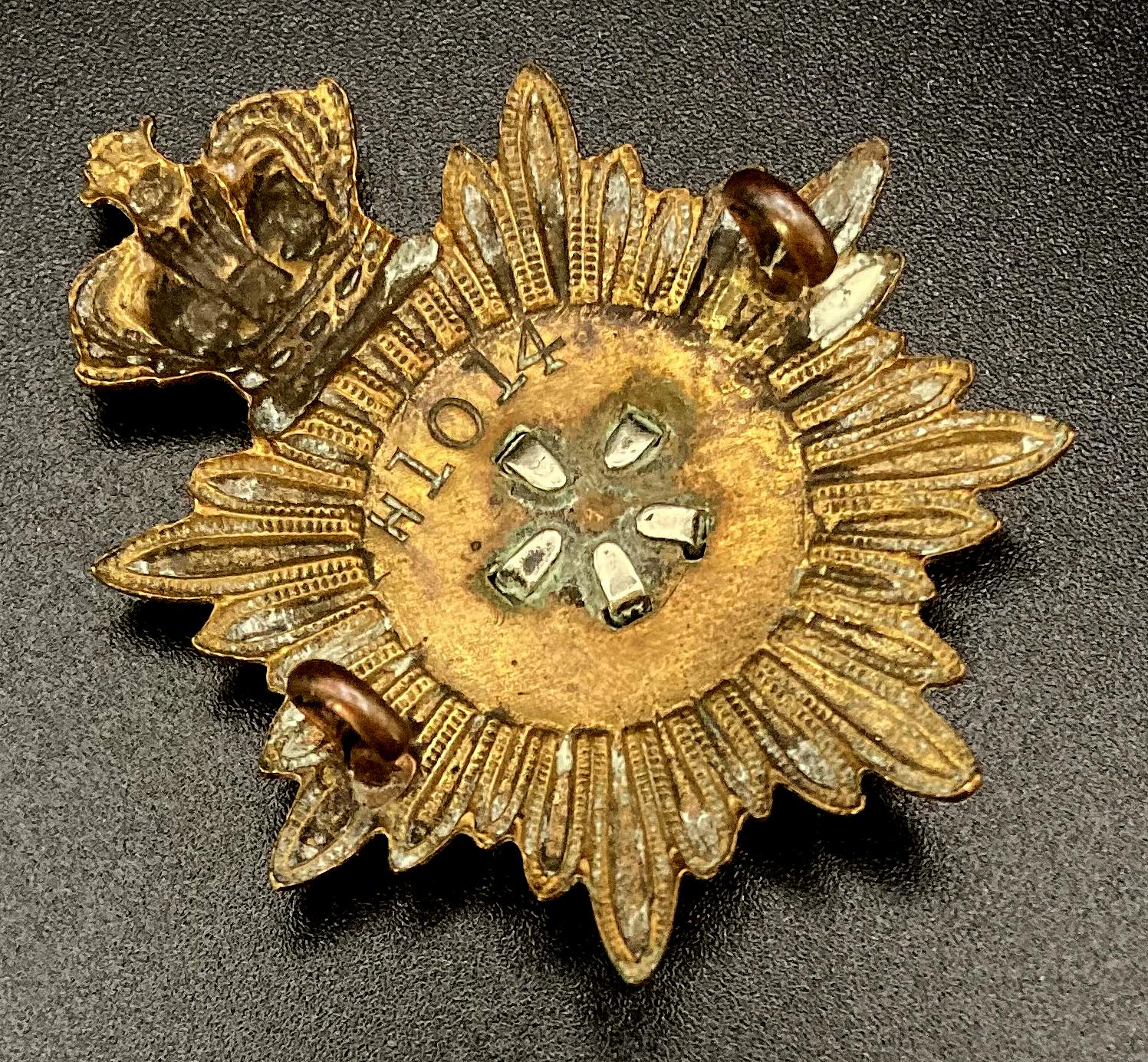 Angled view of reverse of British Legion Standard Bearer's cap badge