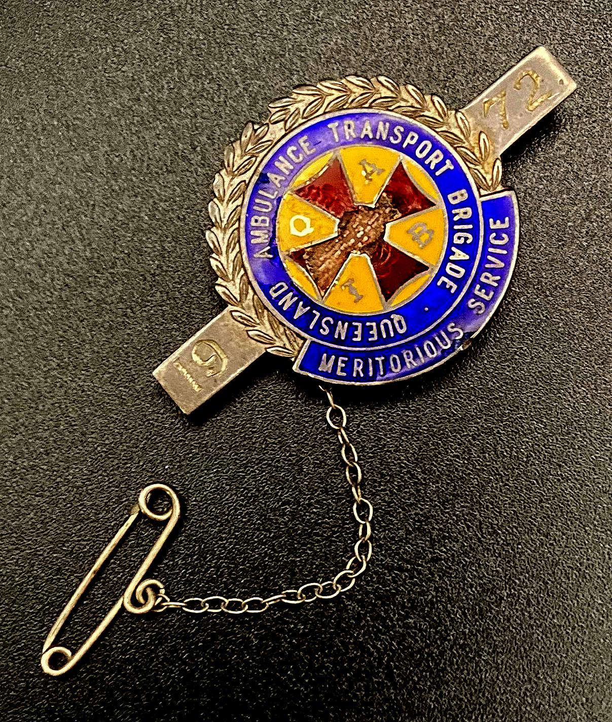 Angled view of Queensland Ambulance Transport Brigade meritorious service badge