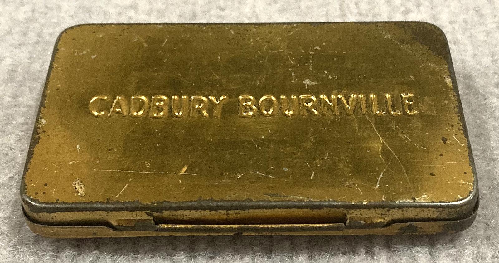 Oblique view of underside of souvenir chocolate tin - Coronation of King George V and Queen Mary (1911)
