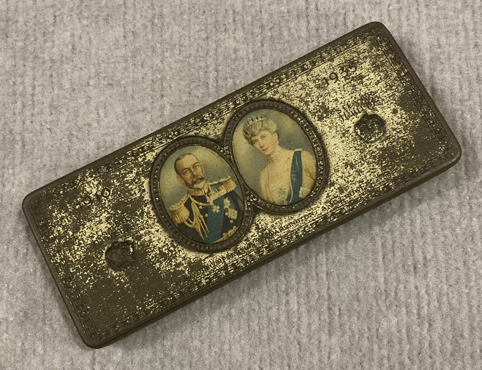 Angled view of commemorative chocolate tin - Silver Jubilee of King George V and Queen Mary (1910–1935)