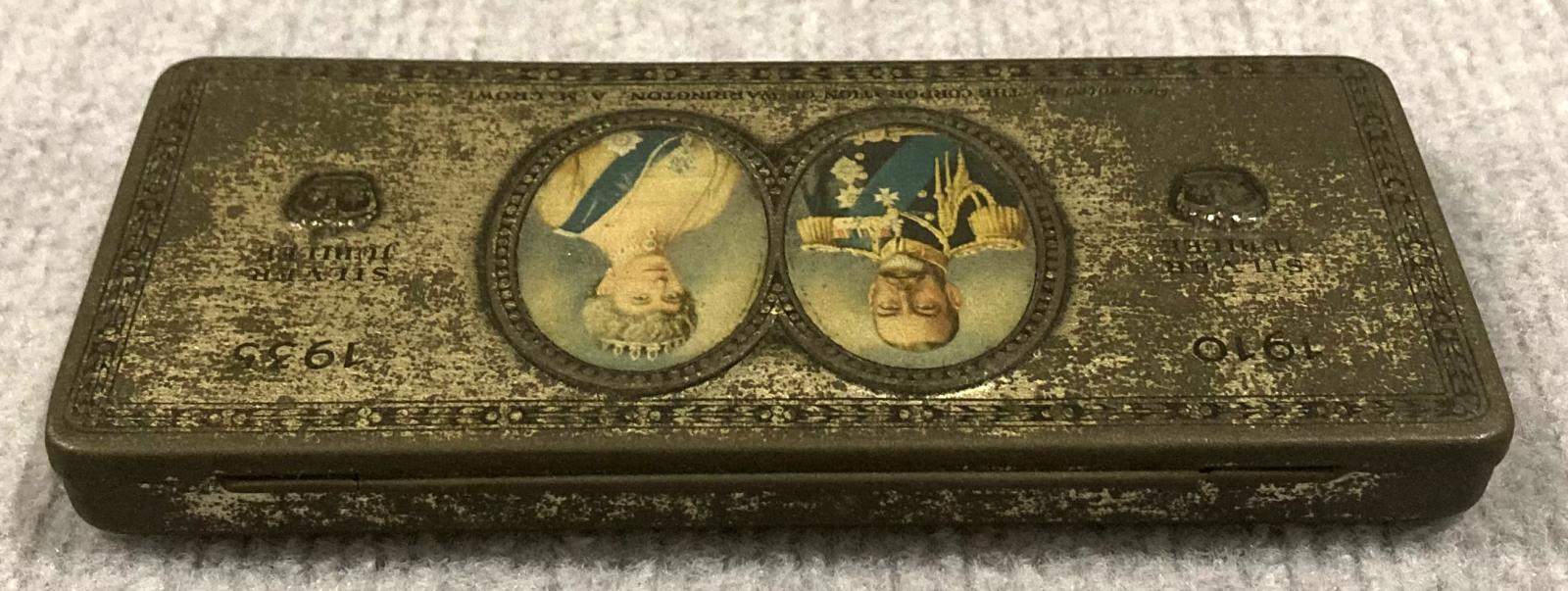 Oblique view from back of commemorative chocolate tin - Silver Jubilee of King George V and Queen Mary (1910–1935)