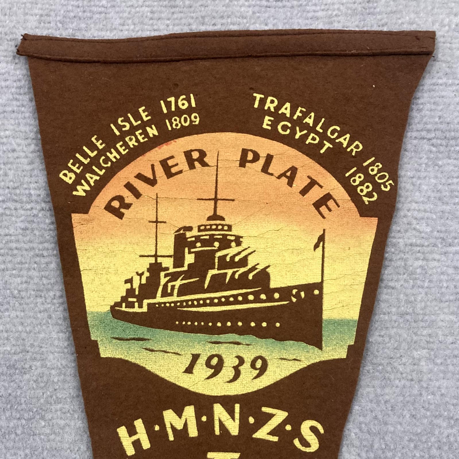 Close up of upper section of souvenir felt naval pennant - HMNZS Achilles
