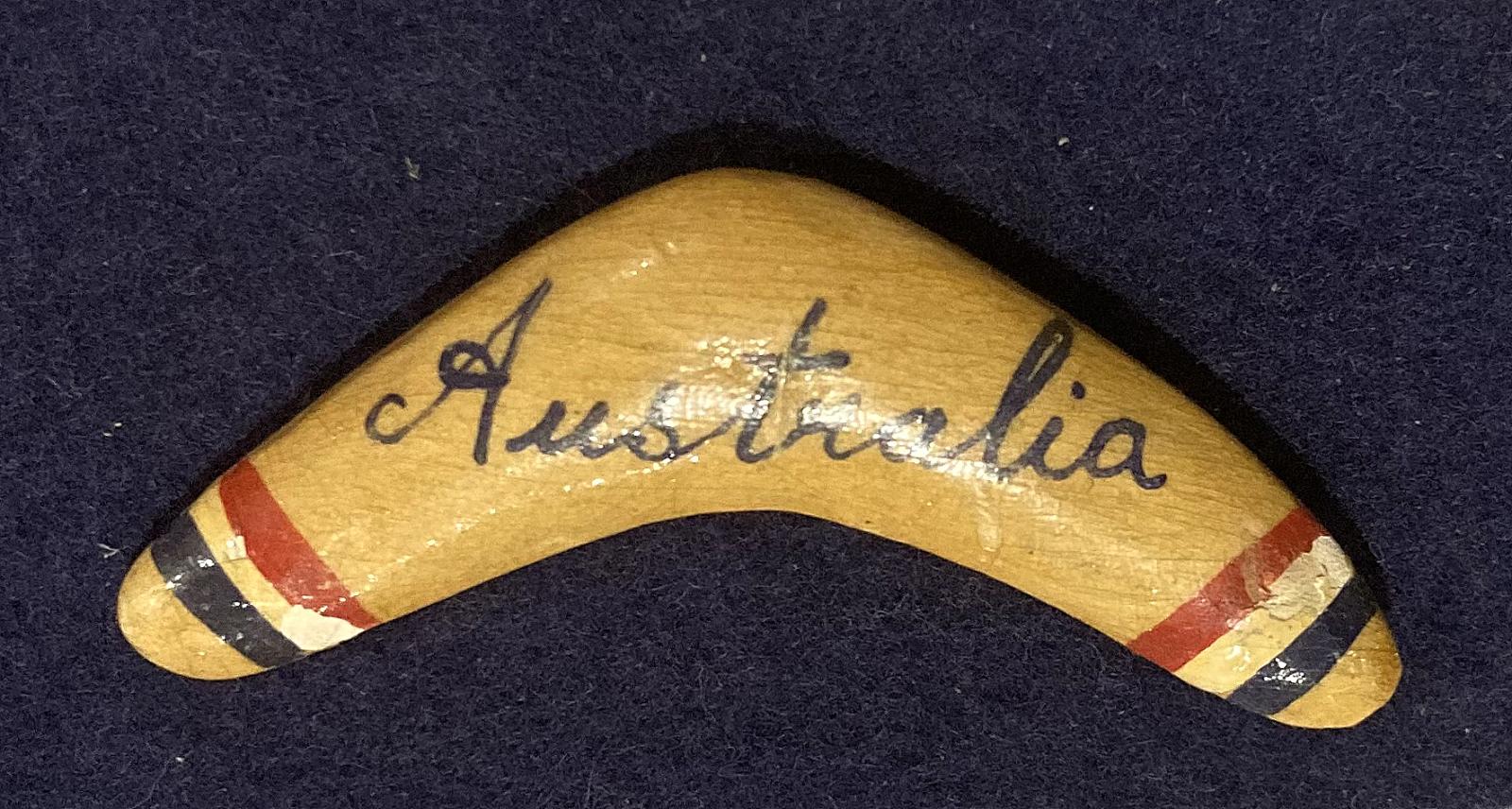 Close up of boomerang brooch