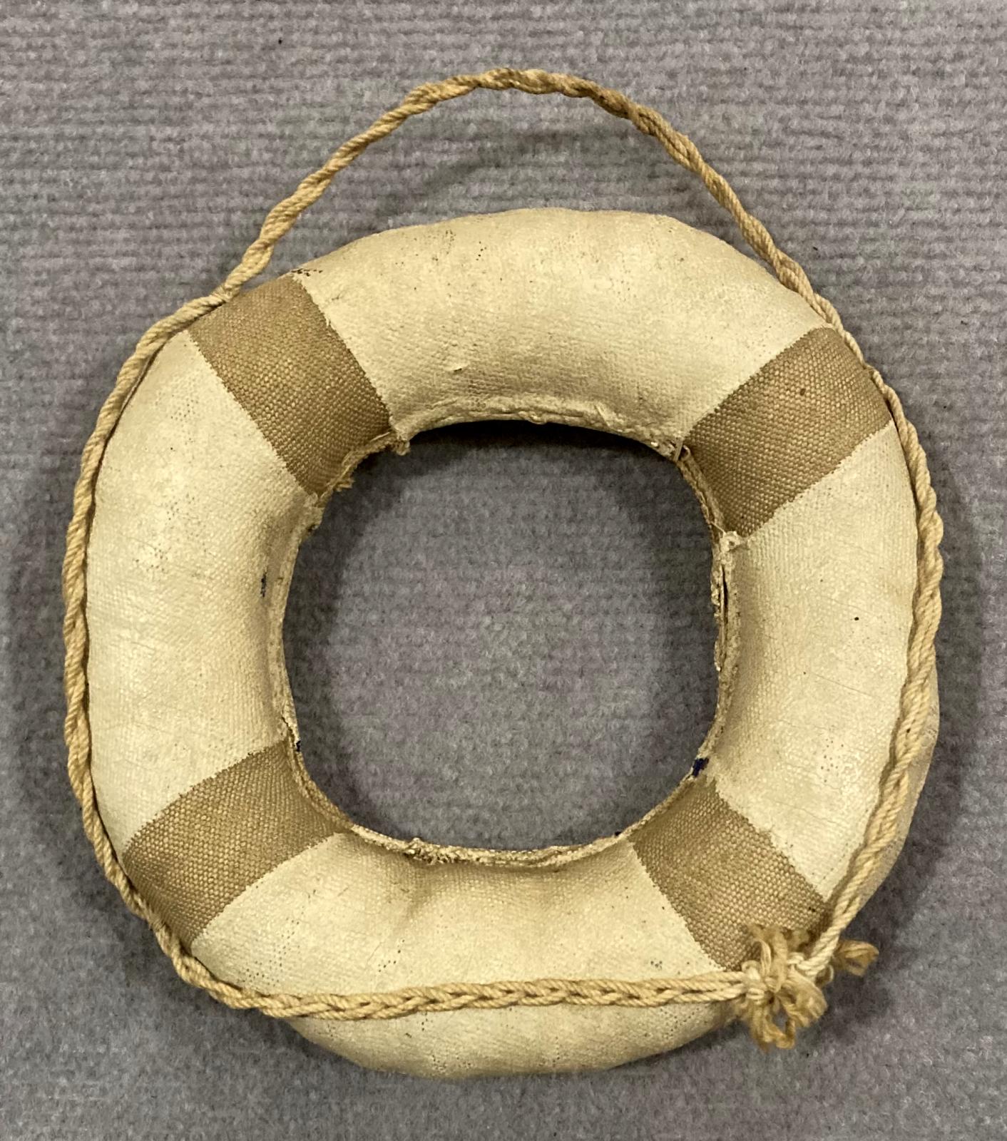 Reverse of souvenir miniature naval lifebuoy - HMAS Kanimbla - 2