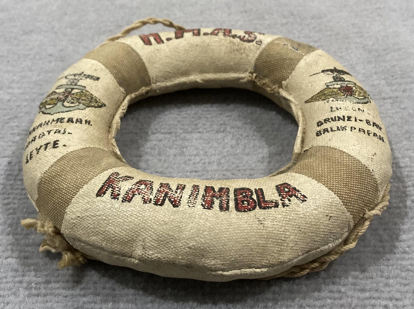 Oblique view of souvenir miniature naval lifebuoy - HMAS Kanimbla - 2
