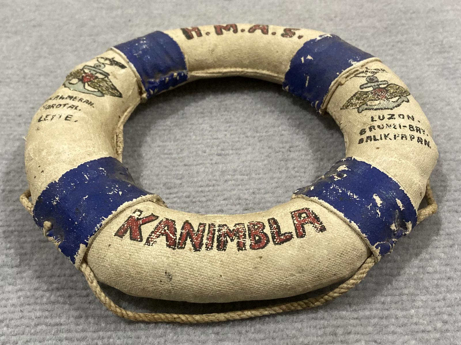 Oblique view of souvenir miniature naval lifebuoy - HMAS Kanimbla - 1