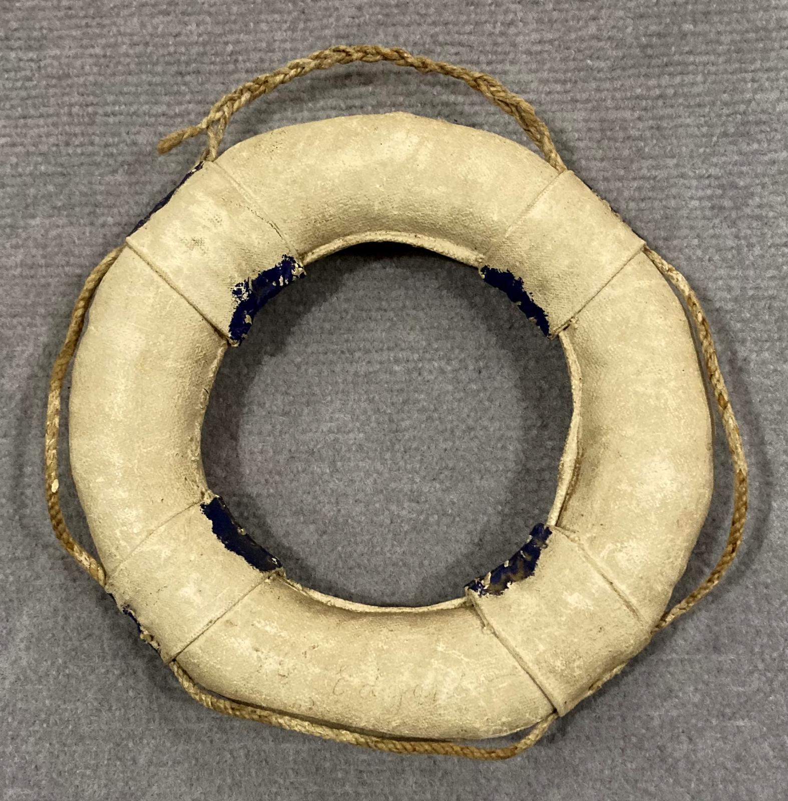 Reverse of souvenir miniature naval lifebuoy - HMAS Kanimbla - 1